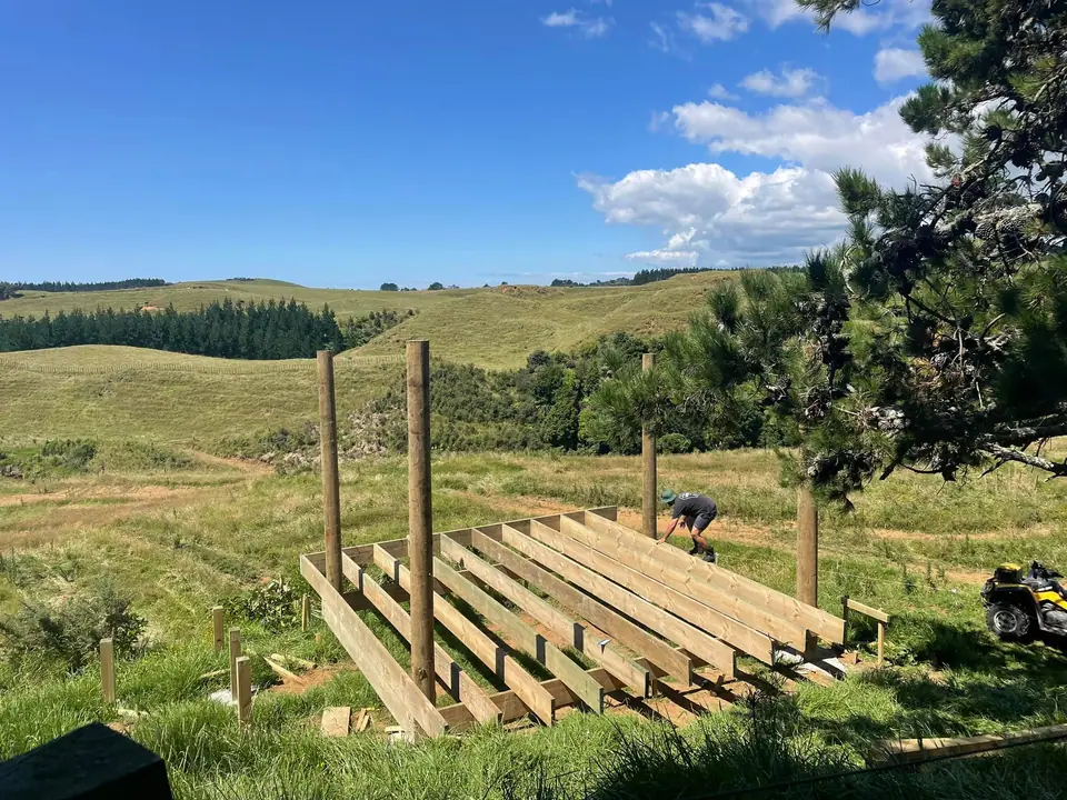 Deck subframe under construction on a rural property