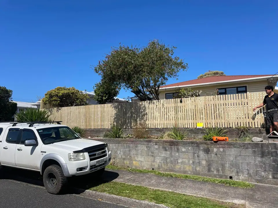 New paling fence being built along a street boundary