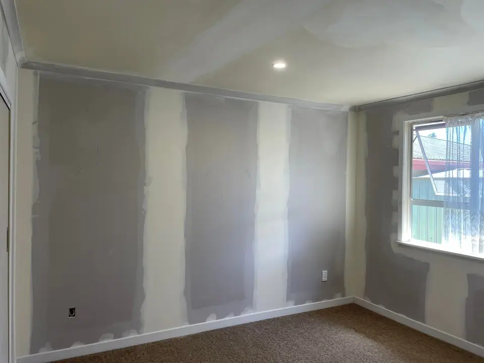 Freshly stopped Gib walls in a room being modernised
