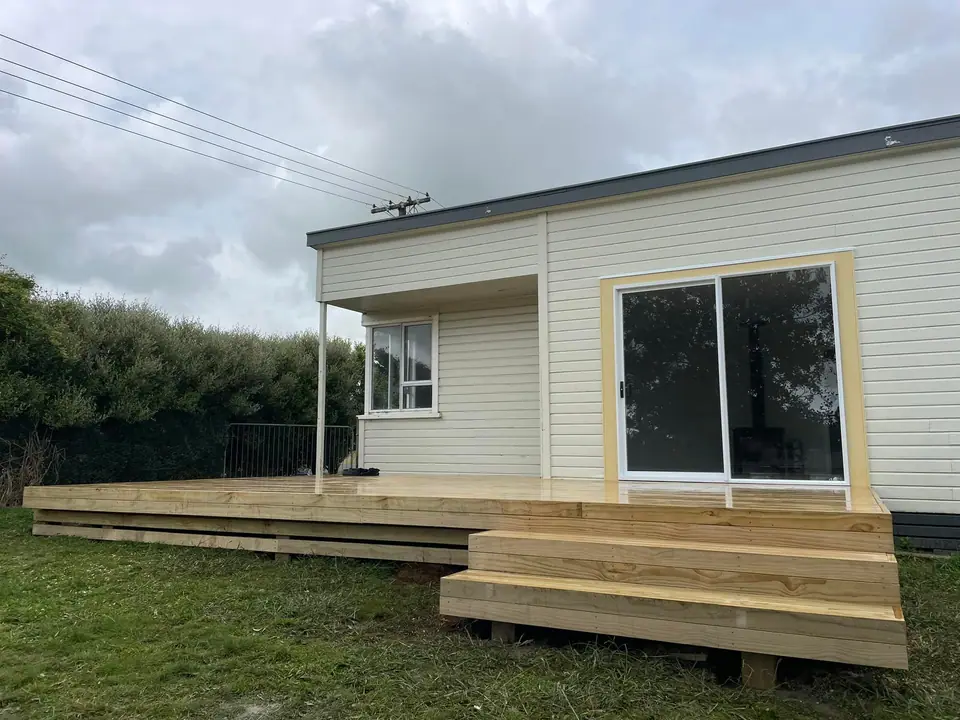 Small cottage with new deck and ranch slider