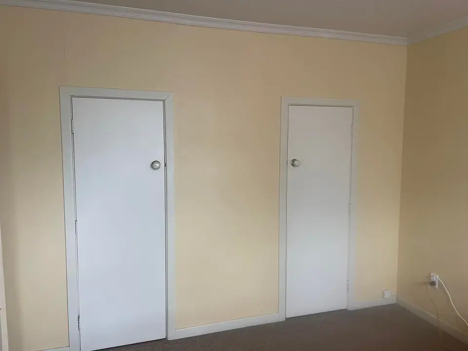 Painted interior with new doors after Gib replacement