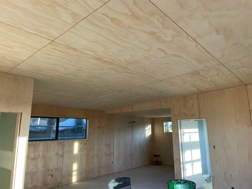 Plywood interior lining with new aluminium windows