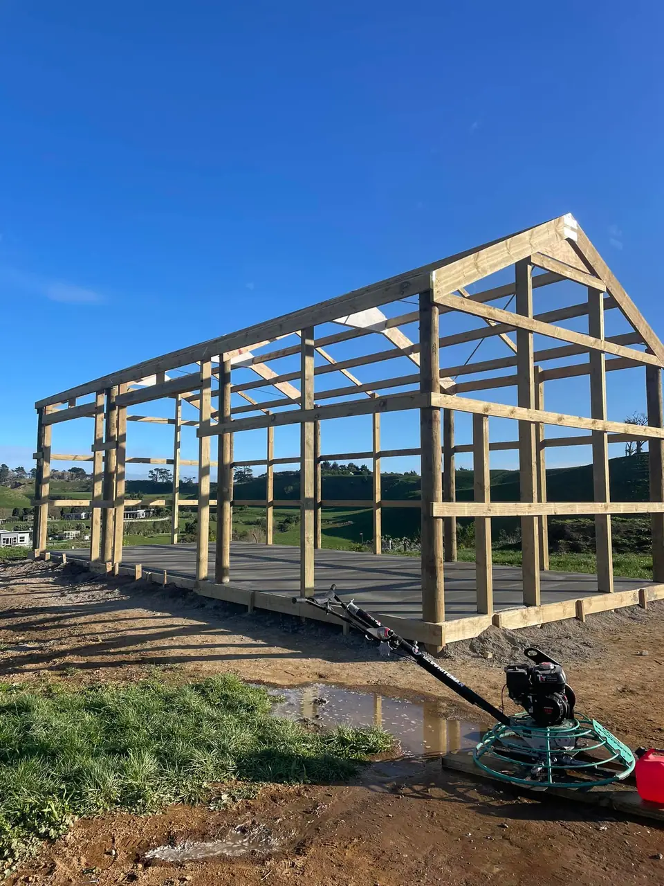 Timber pole shed frame with trusses in place