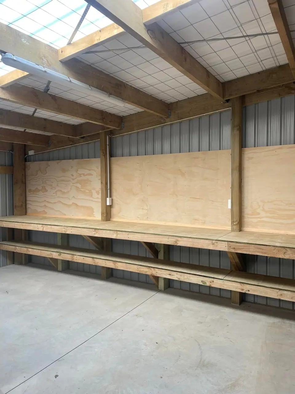Pole shed with part-lined walls and concrete floor