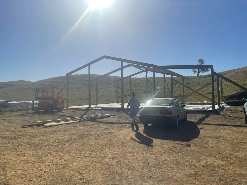 Steel frame being erected on a rural building site